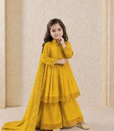 Heavy roman silk embroidery  work and yellow readymade salwar suit