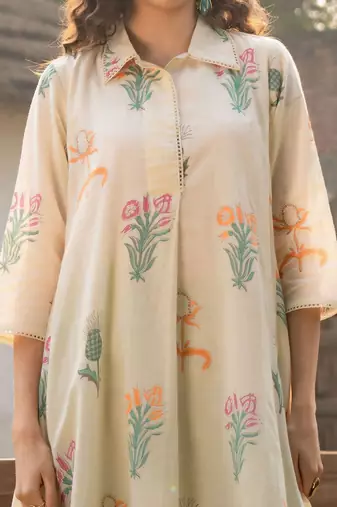 Women Floral Printed Cotton Kurta with Trousers
