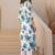 Women Floral Printed Beads and Stones Cotton Kurta with Trousers