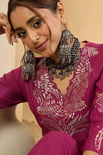 Women Embroidered Thread Work Kurta with Trousers