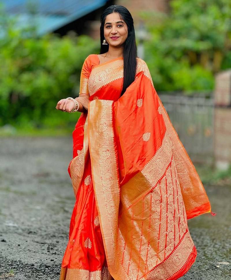 Orange soft silk blend saree with zari weaving meenakari design