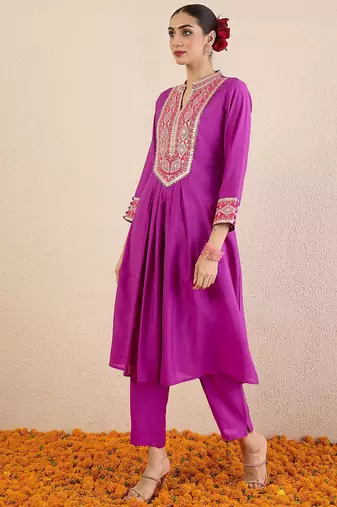 Women Solid Embroidered Kurta with Pyjama