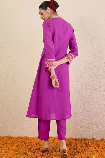 Women Solid Embroidered Kurta with Pyjama