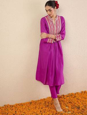 Women Solid Embroidered Kurta with Pyjama 6