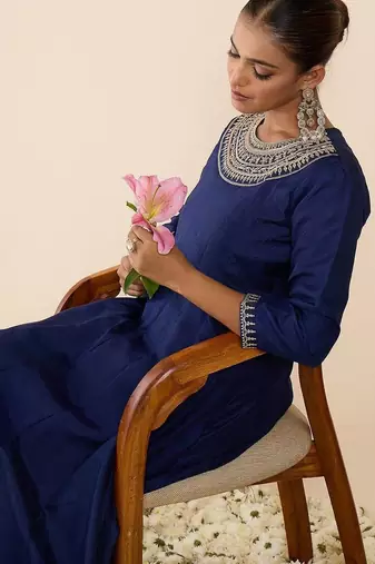 Women Ethnic Motifs Embroidered Panelled Thread Work Kurta with Trousers