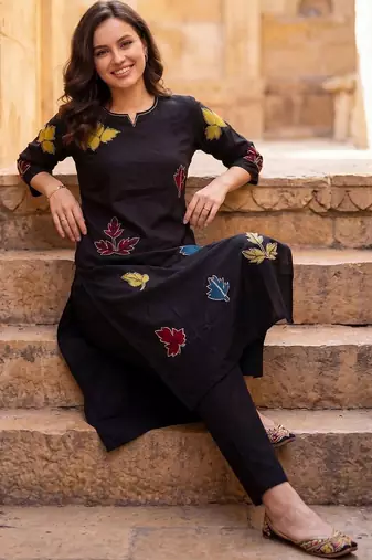 Women Ethnic Motifs Embroidered Thread Work Kurta with Trousers