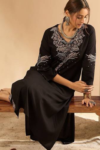 Women Embroidered Kurta with Trousers