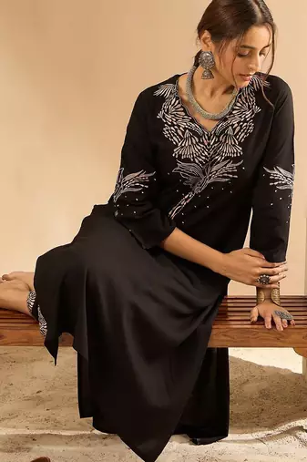 Women Embroidered Kurta with Trousers