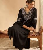 Women Embroidered Kurta with Trousers