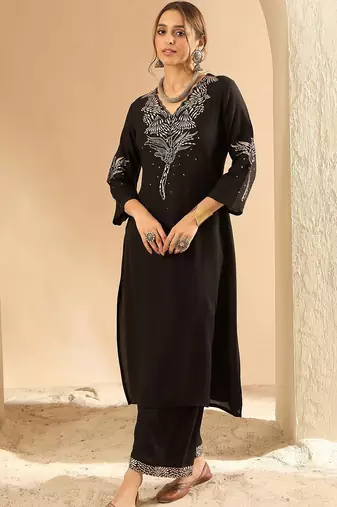 Women Embroidered Kurta with Trousers