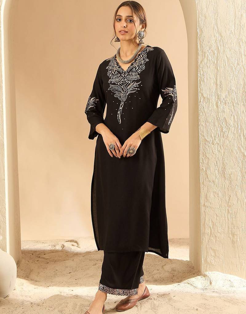 Women Embroidered Kurta with Trousers