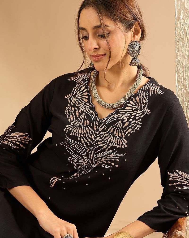 Women Embroidered Kurta with Trousers