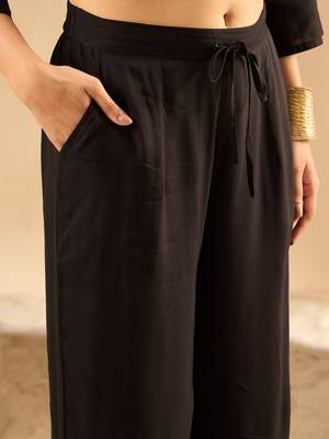 Women Embroidered Kurta with Trousers 4