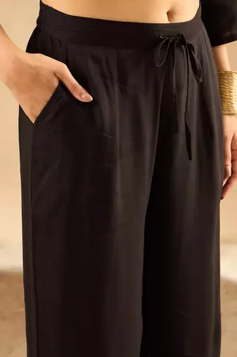 Women Embroidered Kurta with Trousers