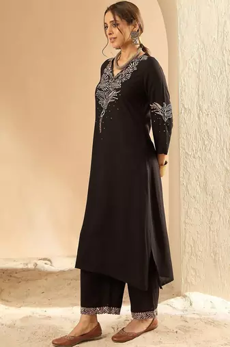Women Embroidered Kurta with Trousers