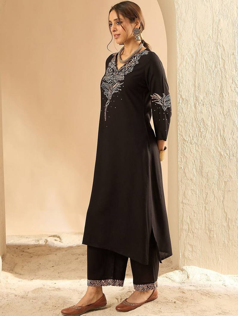 Women Embroidered Kurta with Trousers