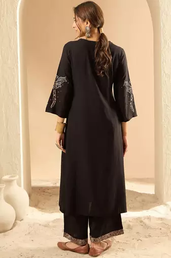 Women Embroidered Kurta with Trousers