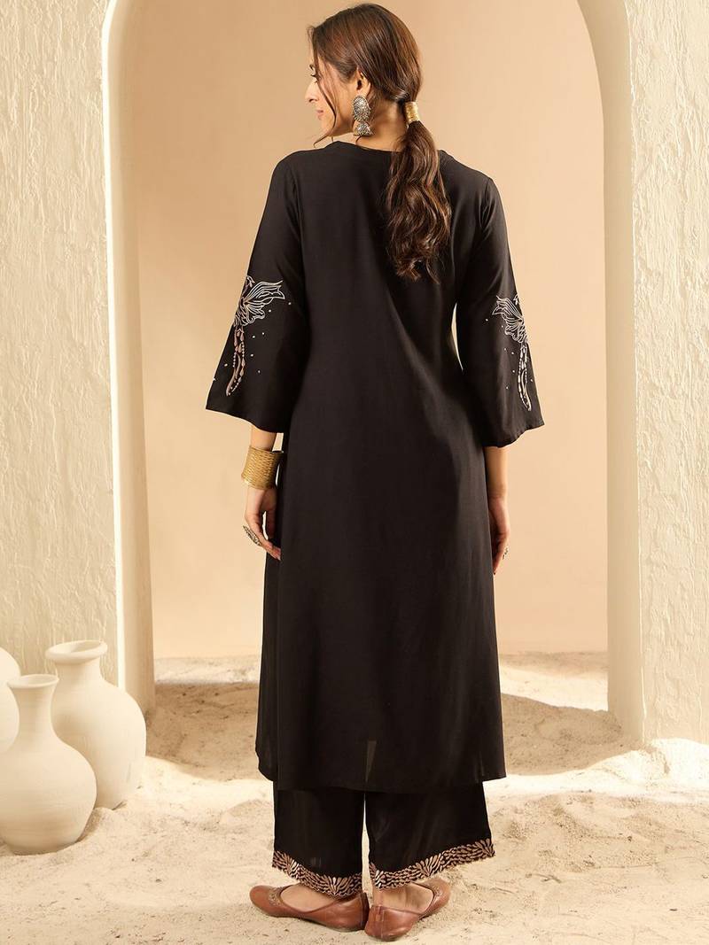 Women Embroidered Kurta with Trousers