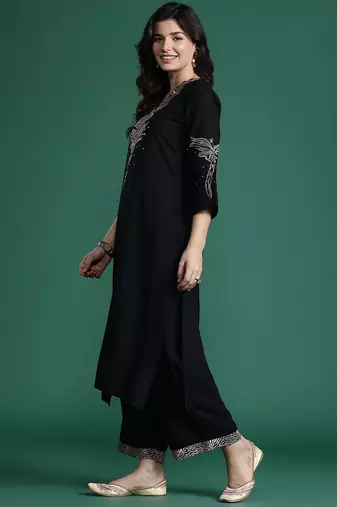 Solid Kurta with Trousers with Embroidered Detail