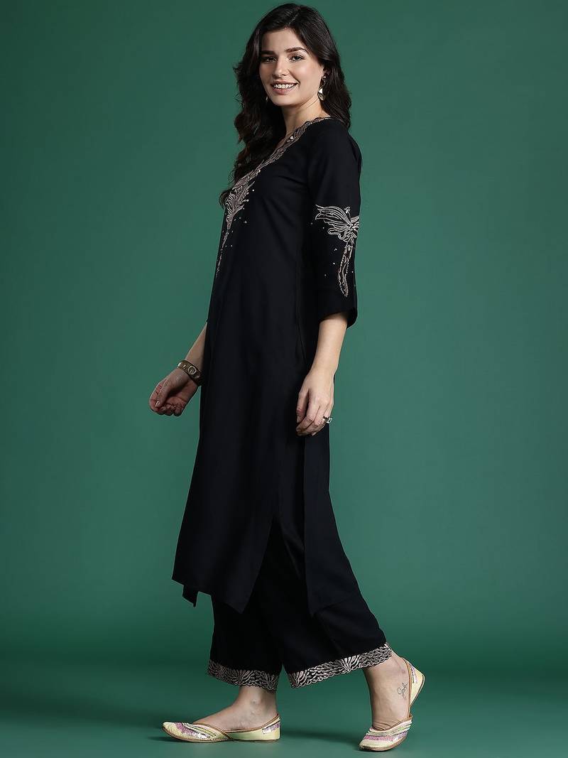 Solid Kurta with Trousers with Embroidered Detail