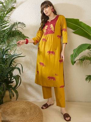 Women Animal Printed Tiered Thread Work Cotton Kurta with Trousers 1