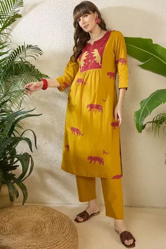 Women Animal Printed Tiered Thread Work Cotton Kurta with Trousers