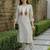 Women Printed Beads and Stones Cotton Kurta with Trousers
