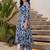 Women Floral Printed Pleated Cotton Kurta with Trousers