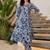 Women Floral Printed Pleated Cotton Kurta with Trousers