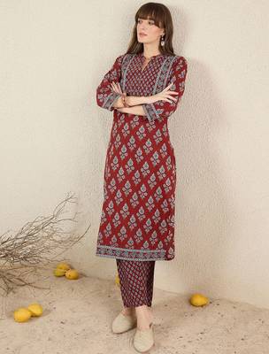 Women Floral Printed Cotton Kurta with Trousers 6