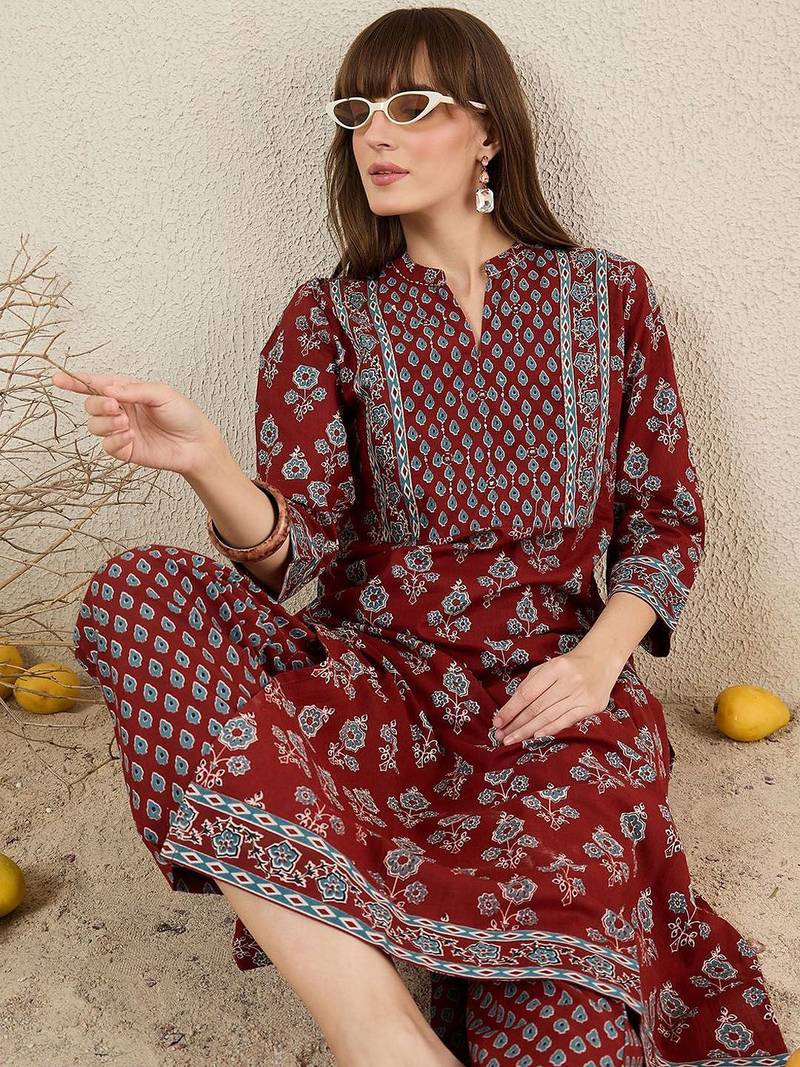 Women Floral Printed Cotton Kurta with Trousers