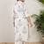 Plus Size Off White Printed Straight Kurta Palazzos Set