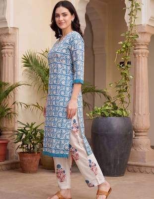 Women Floral Printed Thread Work Cotton Kurta with Trousers 4