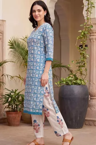 Women Floral Printed Thread Work Cotton Kurta with Trousers