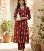 Women Printed Cotton Kurta with Trousers