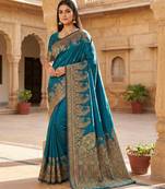 Teal pashmina paithani silk saree with beautifully multicolor border and pallu