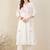 Women Floral Embroidered Angrakha Thread Work Cotton Kurta with Trousers