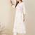 Women Floral Embroidered Angrakha Thread Work Cotton Kurta with Trousers