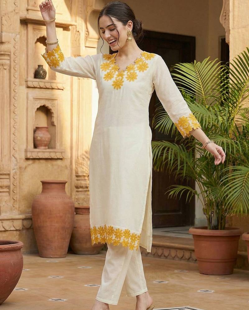 Women Floral Embroidered Thread Work Cotton Kurta with Trousers