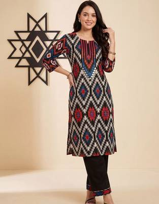 Women Printed Cotton Kurta with Trousers 6
