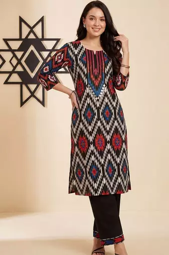 Women Printed Cotton Kurta with Trousers