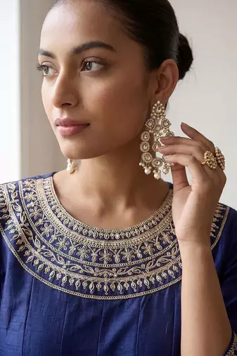 Women Ethnic Motifs Embroidered Panelled Thread Work Kurta with Trousers