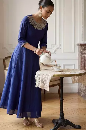 Women Ethnic Motifs Embroidered Panelled Thread Work Kurta with Trousers