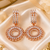 Rose gold circular crystal statement earrings
