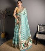 Turquoise blue floral print, striped, woven cotton slub kalamkari saree with blouse