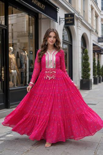 Rani-pink georgette free size stitched navratri anarkali suit with laheriya & kutchi patchework