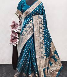 turquoise art silk blend banarasi jacquard work saree with unstitched blouse piece