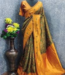green orange art silk blend banarasi jacquard work saree with unstitched blouse piece