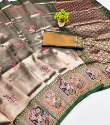 green gajri art silk blend jacquard work saree with unstitched blouse piece