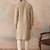 Men beige silk blend embroidered solid straight kurta with trousers